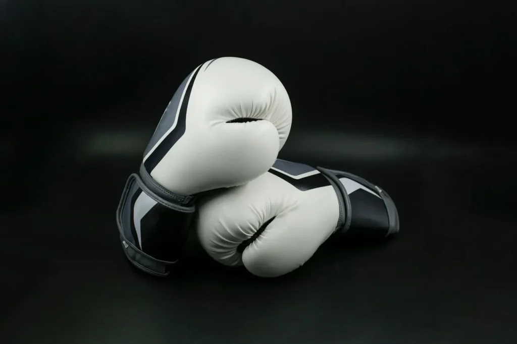 boxing gloves manufacturer developing layered foam combat sports equipment